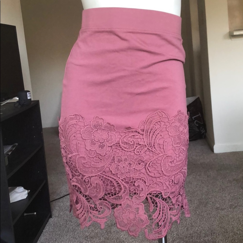 Pastel pink skirt with embroidery trim